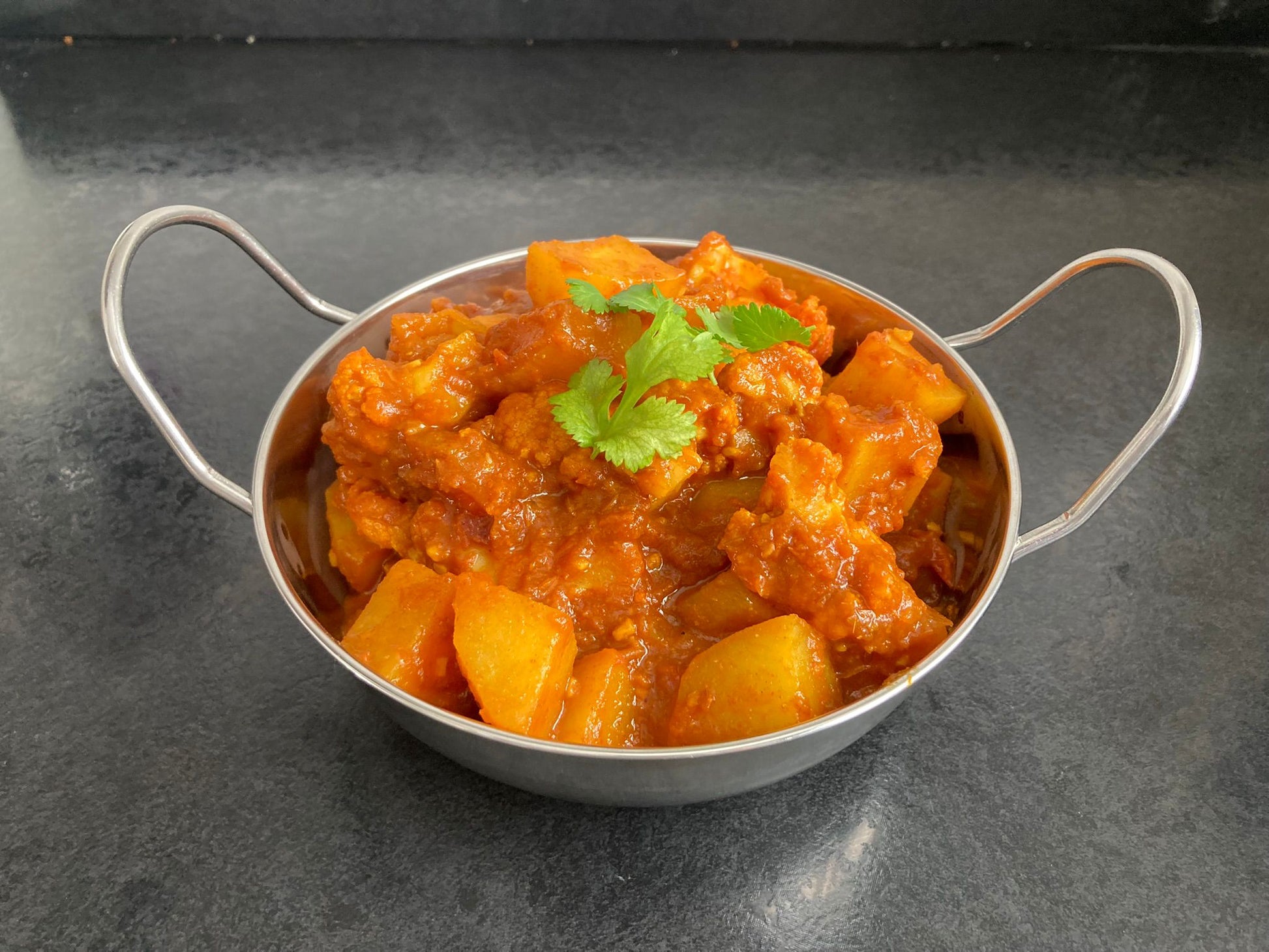 Aloo Gobi in a balti dish.