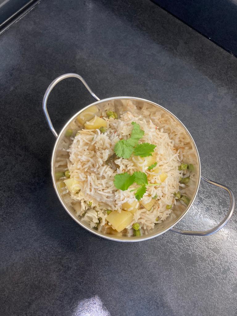 Photo of Matar Pilau rice in a balti dish.