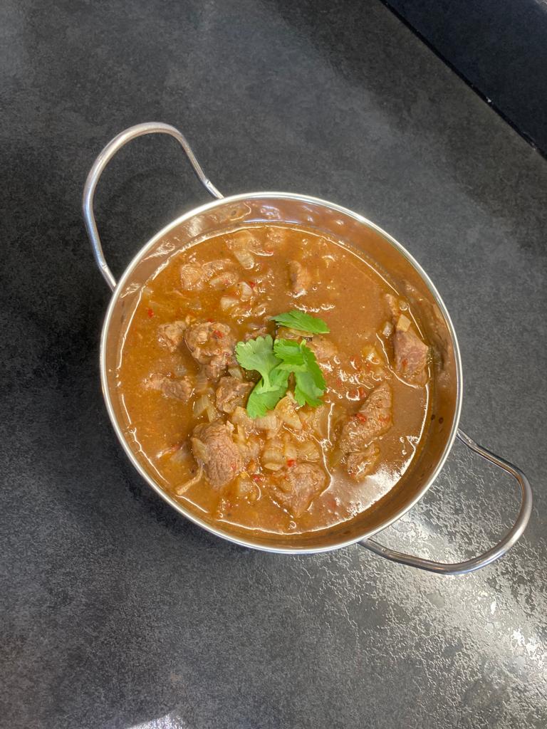 Photo of railway gosht in a balti dish.