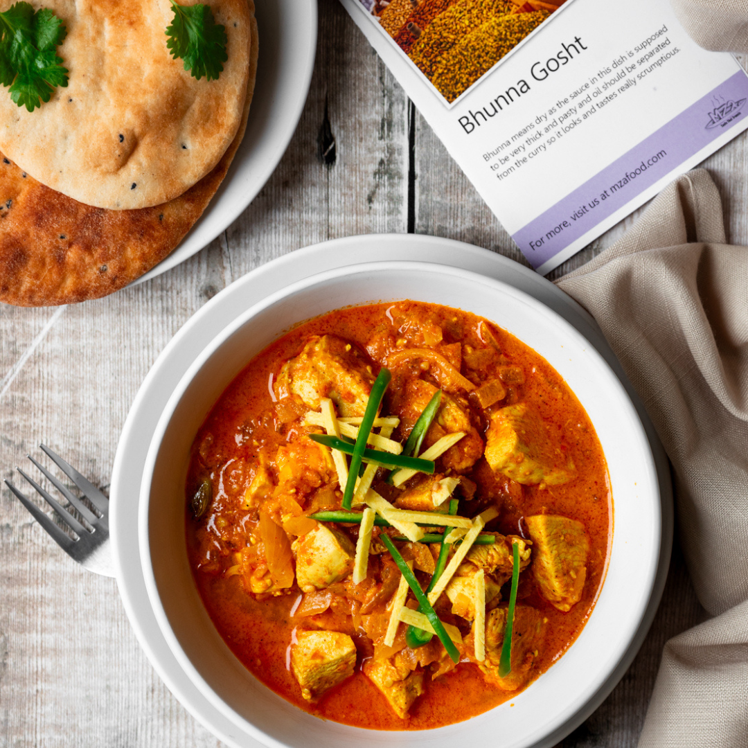 Photo of Bhunna Gosht in a bowl next to the recipe card