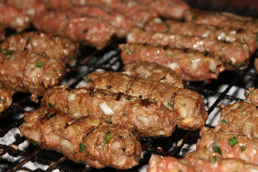 Close up photo of Cevapi (spiced meat sausages)